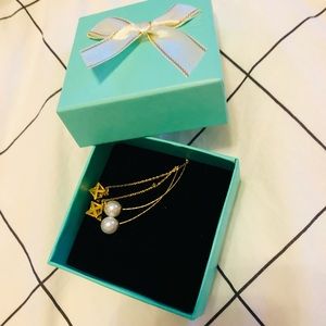 Pearl earring with string